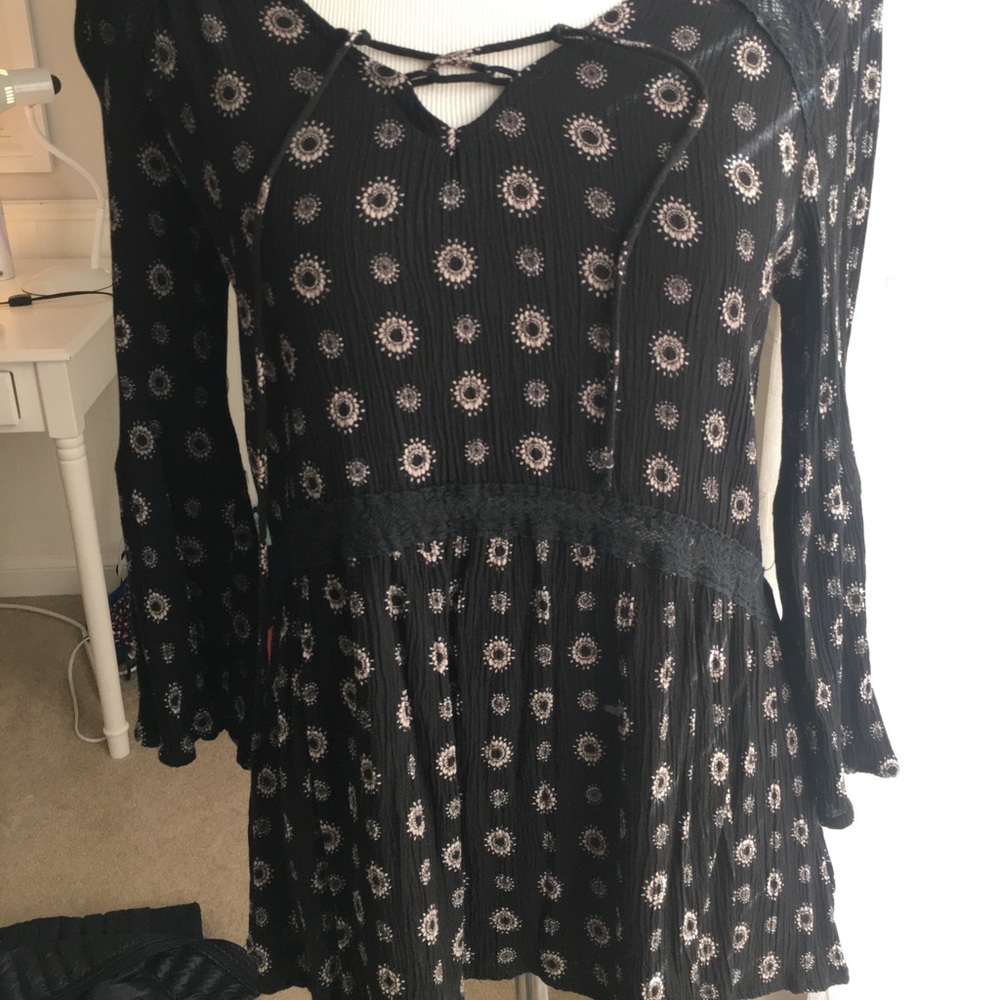 Black flow top with bell sleeves